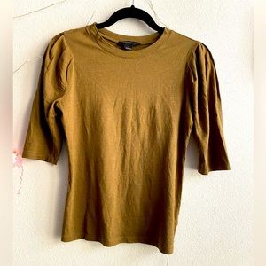 Elbow length top like new. Color is shade of brown